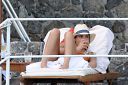 thumb_Jessica_Alba_-_Bikini_at_a_pool_on_vacation_in_Italy_027.jpg