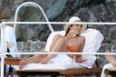 thumb_Jessica_Alba_-_Bikini_at_a_pool_on_vacation_in_Italy_028.jpg