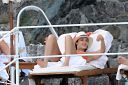 thumb_Jessica_Alba_-_Bikini_at_a_pool_on_vacation_in_Italy_034.jpg