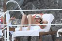 thumb_Jessica_Alba_-_Bikini_at_a_pool_on_vacation_in_Italy_038.jpg
