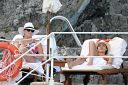 thumb_Jessica_Alba_-_Bikini_at_a_pool_on_vacation_in_Italy_041.jpg
