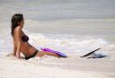 thumb_Jessica_Alba_-_wearing_a_bikinis_at_a_beach_in_Mexico_014.jpg