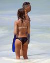 thumb_Jessica_Alba_-_wearing_a_bikinis_at_a_beach_in_Mexico_017.jpg