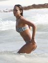 thumb_Jessica_Alba_-_wearing_a_bikinis_at_a_beach_in_Mexico_034.jpg