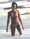 thumb_Jessica_Alba_-_wearing_a_bikinis_at_a_beach_in_Mexico_038.jpg