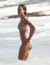 thumb_Jessica_Alba_-_wearing_a_bikinis_at_a_beach_in_Mexico_056.jpg
