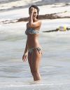 thumb_Jessica_Alba_-_wearing_a_bikinis_at_a_beach_in_Mexico_063.jpg