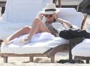 thumb_Jessica_Alba_-_wearing_a_bikinis_at_a_beach_in_Mexico_110.jpg