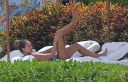 thumb_Jessica_Alba_-_wearing_a_bikinis_at_a_beach_in_Mexico_137.jpg