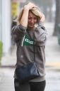 thumb_Kaley_Cuoco_leaving_the_Gym_getting_caught_in_the_rain_in_Los_Angeles_047.jpg