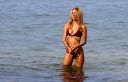 thumb_Kimberley_Garner_wearing_a_bikini_in_St_Tropez_003.jpg