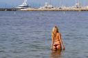 thumb_Kimberley_Garner_wearing_a_bikini_in_St_Tropez_019.jpg