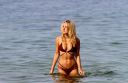thumb_Kimberley_Garner_wearing_a_bikini_in_St_Tropez_020.jpg