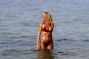 thumb_Kimberley_Garner_wearing_a_bikini_in_St_Tropez_025.jpg