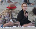 thumb_Lindsay_Lohan_-_wearing_a_bikini_top_at_a_beach_in_California_002.jpg