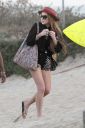 thumb_Lindsay_Lohan_-_wearing_a_bikini_top_at_a_beach_in_California_009.jpg