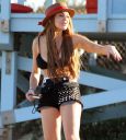 thumb_Lindsay_Lohan_-_wearing_a_bikini_top_at_a_beach_in_California_031.JPG