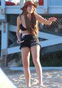 thumb_Lindsay_Lohan_-_wearing_a_bikini_top_at_a_beach_in_California_033.JPG