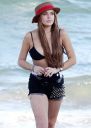 thumb_Lindsay_Lohan_-_wearing_a_bikini_top_at_a_beach_in_California_034.JPG