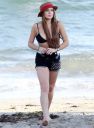 thumb_Lindsay_Lohan_-_wearing_a_bikini_top_at_a_beach_in_California_035.JPG