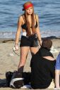 thumb_Lindsay_Lohan_-_wearing_a_bikini_top_at_a_beach_in_California_040.JPG