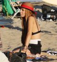 thumb_Lindsay_Lohan_-_wearing_a_bikini_top_at_a_beach_in_California_045.JPG