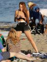 thumb_Lindsay_Lohan_-_wearing_a_bikini_top_at_a_beach_in_California_051.JPG