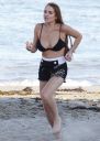 thumb_Lindsay_Lohan_-_wearing_a_bikini_top_at_a_beach_in_California_052.JPG