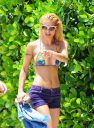 thumb_Michelle_Hunziker_bikini_at_the_Beach_in_Miami_009.jpg