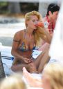 thumb_Michelle_Hunziker_bikini_at_the_Beach_in_Miami_014.jpg