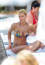 thumb_Michelle_Hunziker_bikini_at_the_Beach_in_Miami_015.jpg