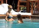 thumb_Michelle_Hunziker_bikini_at_the_Beach_in_Miami_022.jpg