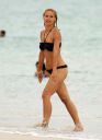 thumb_Michelle_Hunziker_bikini_at_the_Beach_in_Miami_039.jpg