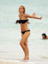 thumb_Michelle_Hunziker_bikini_at_the_Beach_in_Miami_052.jpg