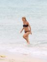 thumb_Michelle_Hunziker_bikini_at_the_Beach_in_Miami_054.jpg