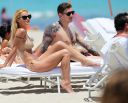 thumb_Michelle_Hunziker_bikini_at_the_Beach_in_Miami_056.jpg
