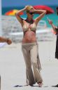 thumb_Michelle_Hunziker_bikini_at_the_Beach_in_Miami_063.jpg