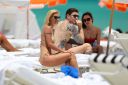 thumb_Michelle_Hunziker_bikini_at_the_Beach_in_Miami_068.jpg