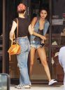 thumb_Selena_Gomez_-_cleavage_and_leggy_at_a_tanning_salon_in_Florida_007.jpg