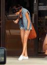 thumb_Selena_Gomez_-_cleavage_and_leggy_at_a_tanning_salon_in_Florida_018.jpg