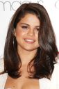 thumb_Selena_Gomez_leggy_and_cleavage_at_her_new_perfume_launch_002.jpg