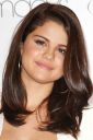 thumb_Selena_Gomez_leggy_and_cleavage_at_her_new_perfume_launch_003.jpg