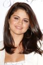 thumb_Selena_Gomez_leggy_and_cleavage_at_her_new_perfume_launch_006.jpg
