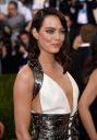 thumb_Emma_Stone_braless_wearing_white_high_slit_plunging_dress_for_Costume_Institute_Gala_2016_in_NYC_002.jpg